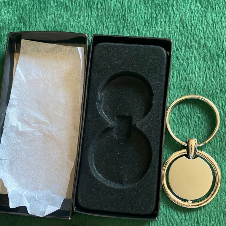 Брелок металевий Ø35 мм поворотний - Зображення 3